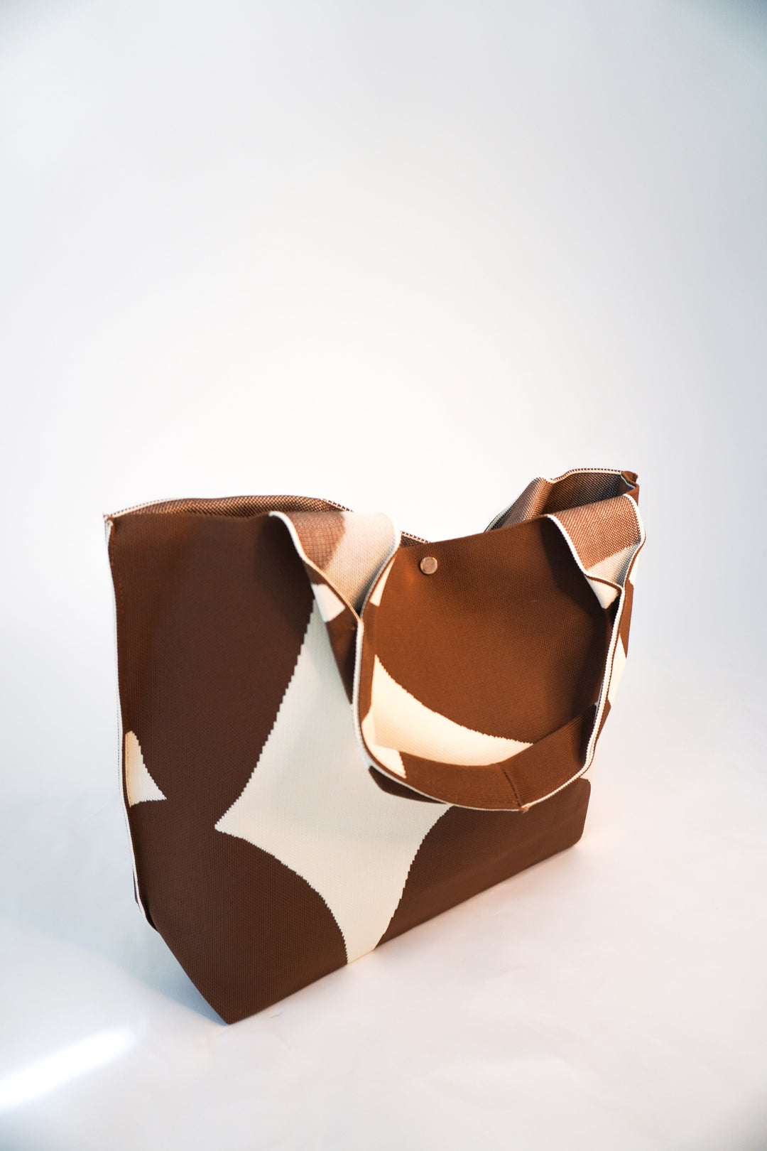 MOOdy Latte Signature tote bag in brown and cream abstract pattern, structured shape