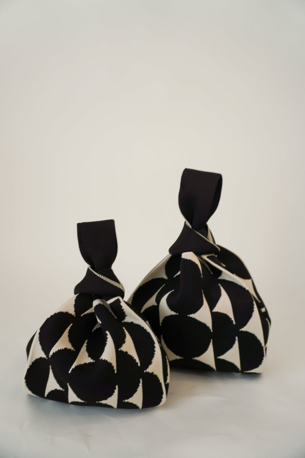 Black Portobello handbag set of two drawstring pouches with graphic black-and-white print