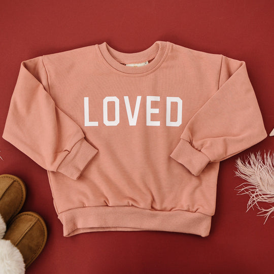 Salmon/pink crewneck sweatshirt with &