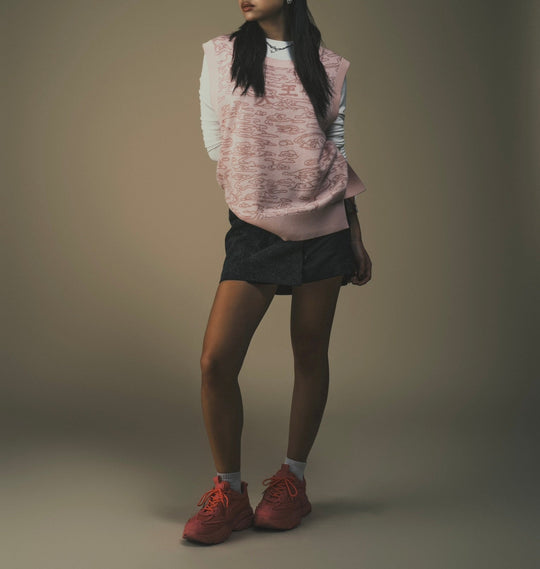 Light pink jacquard sweater vest, sleeveless crewneck with tonal all-over motif