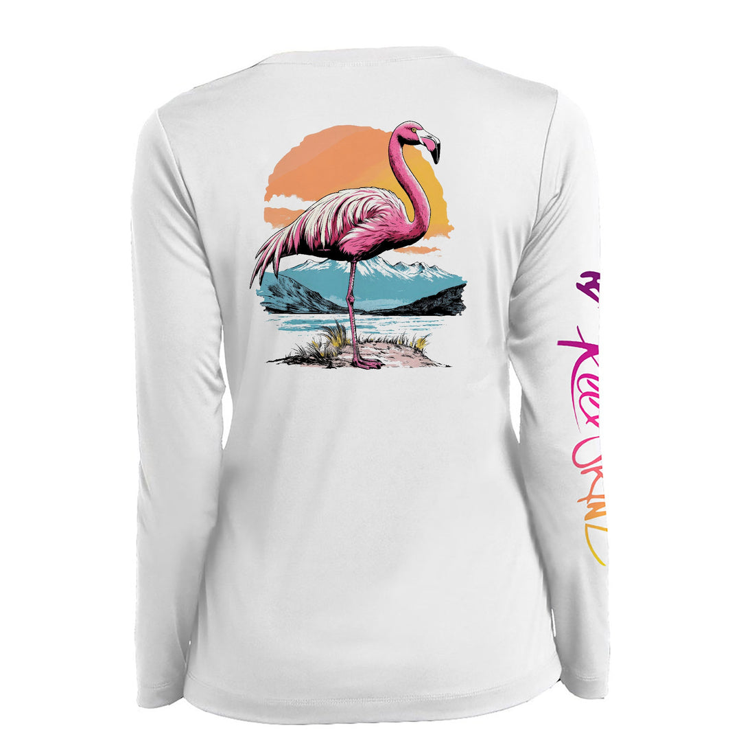 Ladies Flamingo Sunset white long-sleeve top, flamingo beach graphic on back.