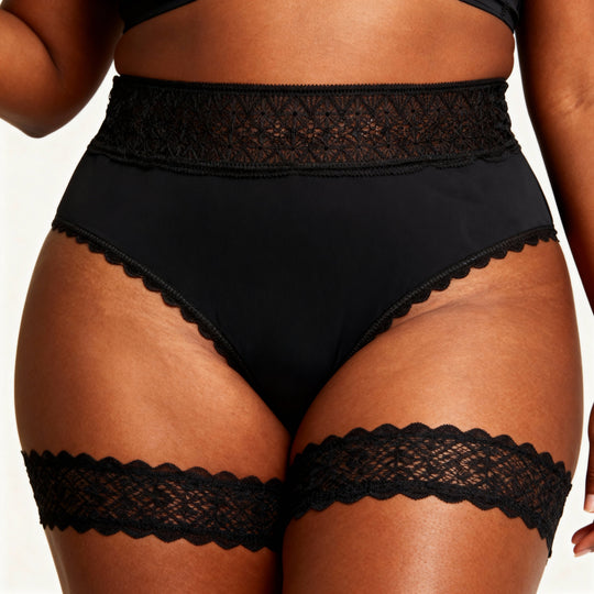 Black low-rise lace control brief with lace waistband and lace hem trim
