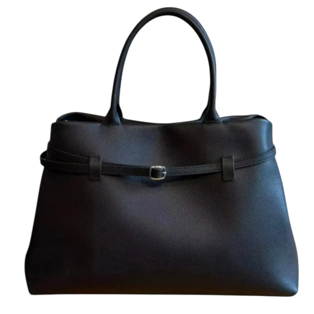 THE XL Sarah Large belt tote bag in black, front view with belt strap across top and buckle center.