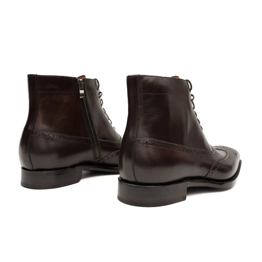 Dark brown lace-up Martin boots with side zipper and brogue trim along the quarters