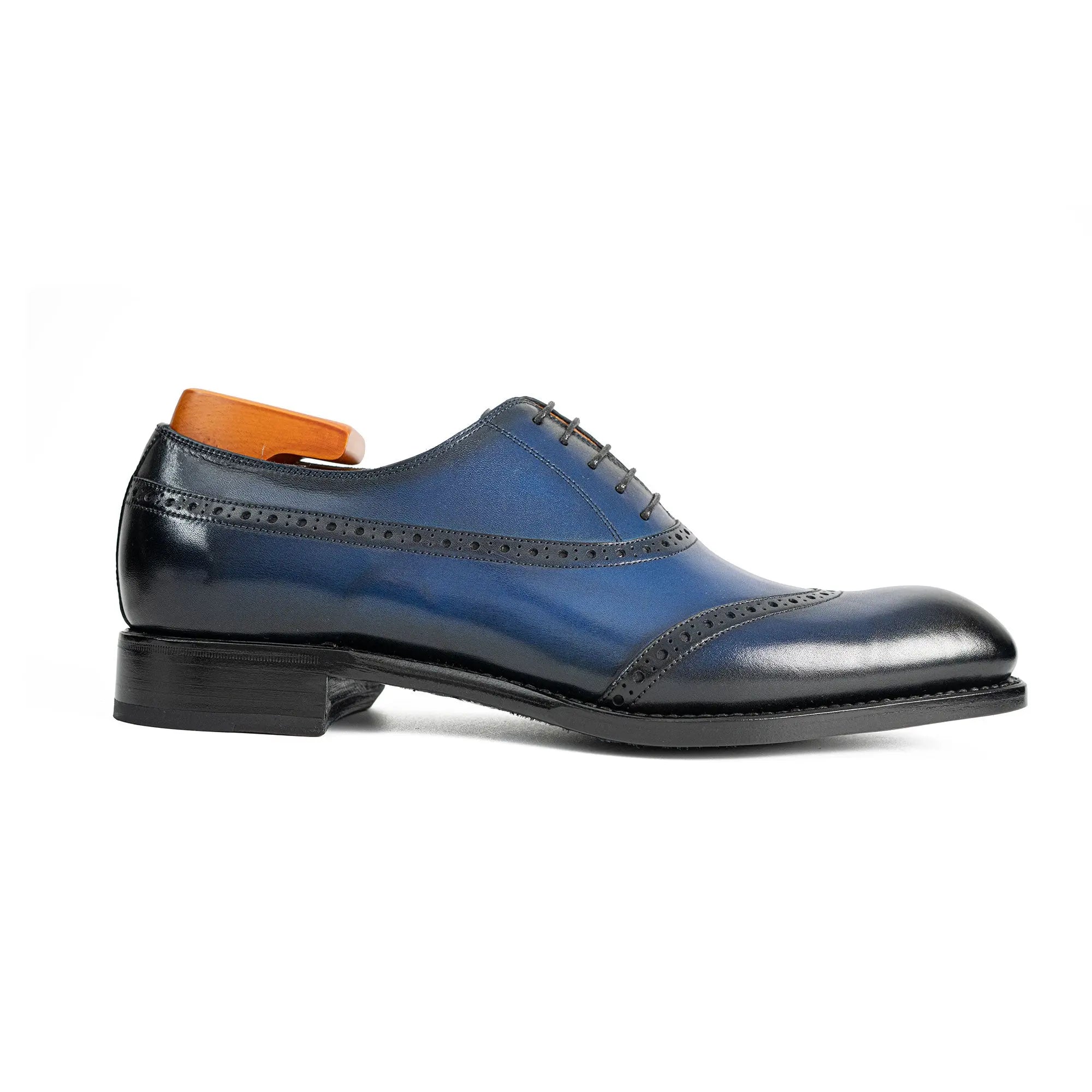Goodyear blue oxford dress shoes with laces and perforated brogue detailing