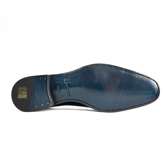 Blue oxford dress shoes outsole, textured sole with heel and toe wear