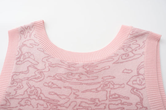 Light pink knit sweater vest neckline and shoulders, ribbed trim, tonal jacquard motif