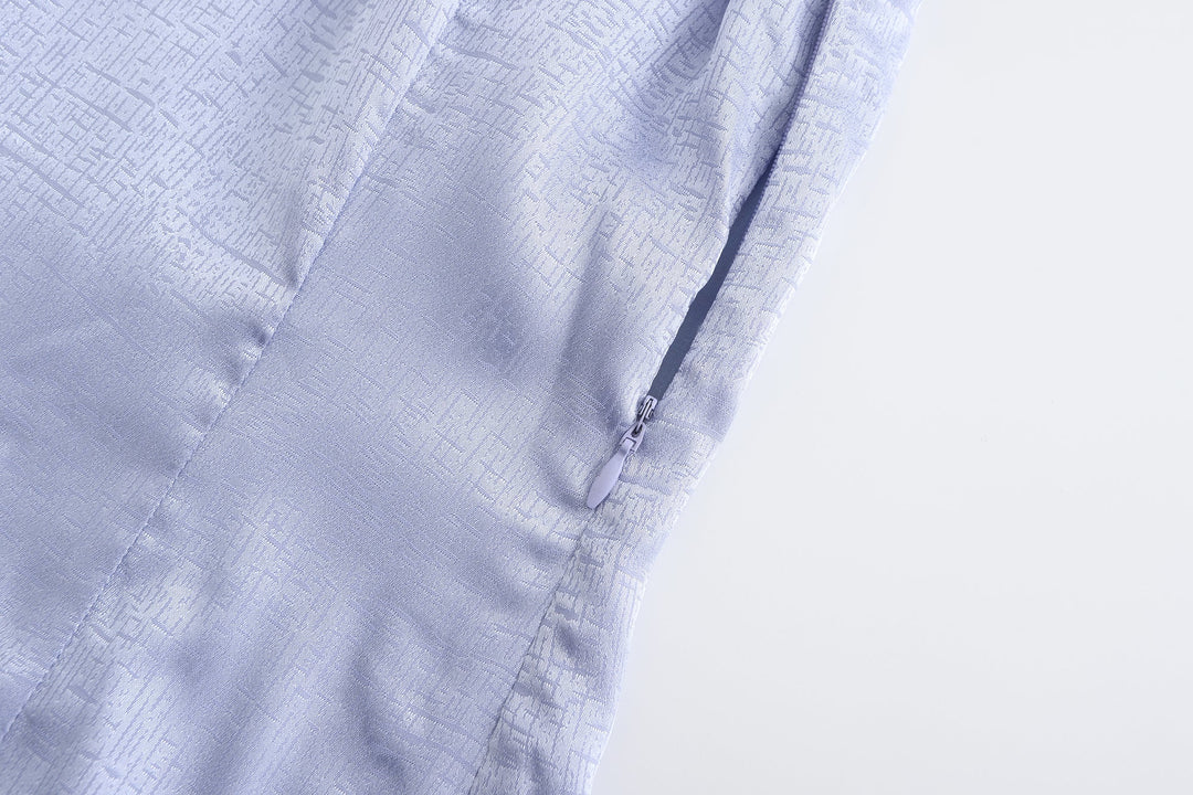Periwinkle sleeveless dress detail showing side zipper and seam