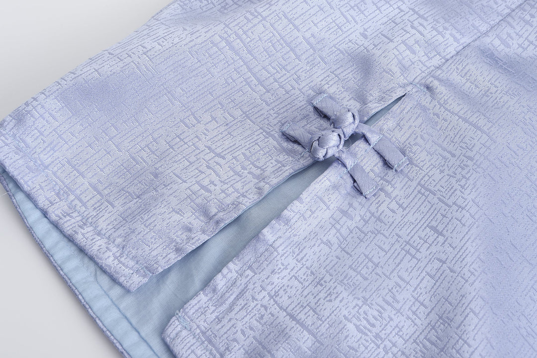 Periwinkle brocade mini dress with gathered back bow detail