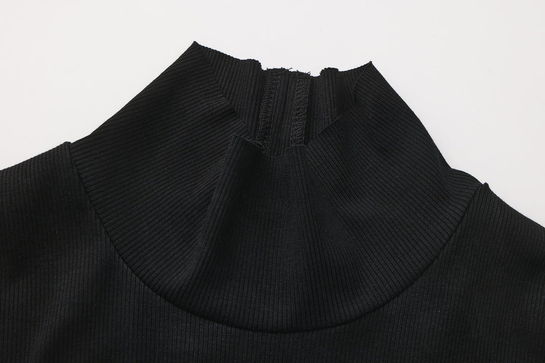 Black high neckline and collar seam detail on the maxi dress