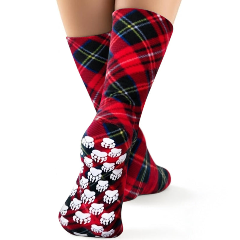 Nonskid-Fleece-Socken mit Pfotenmuster am Fuß, rot mit dunkelblauem und grün-gelbem Karo