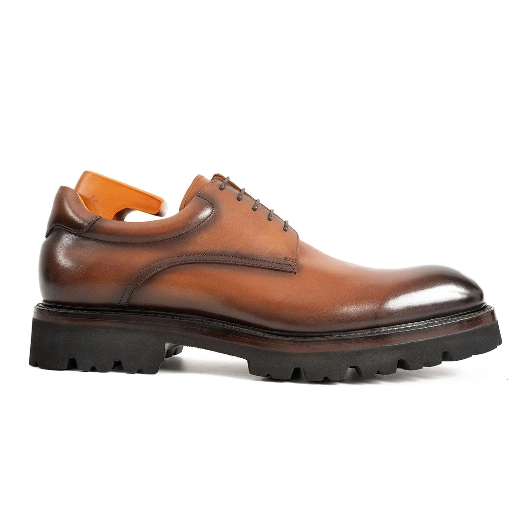 Brown derby shoes, lace-up with thick lug sole and rounded toe