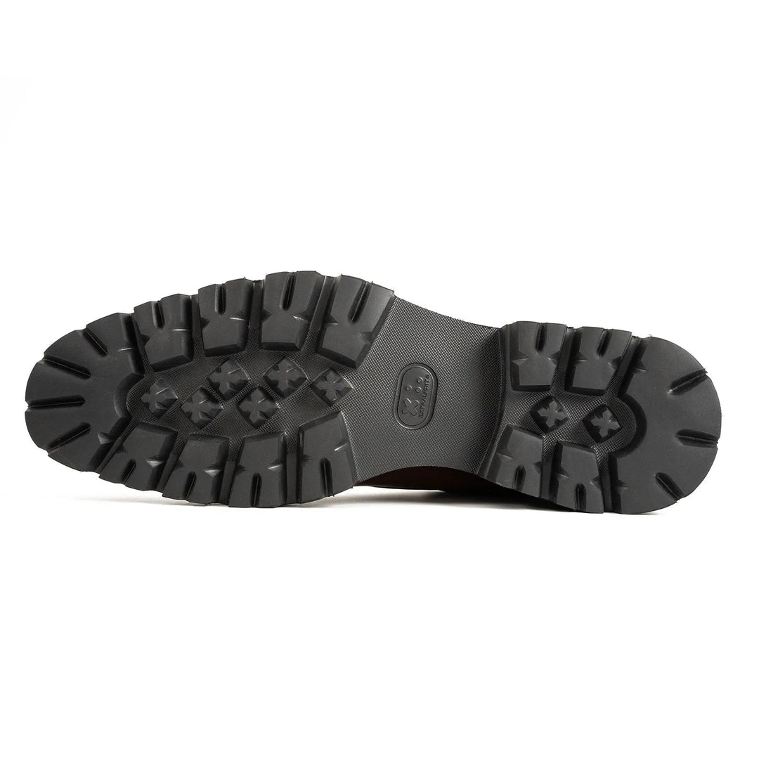 Rubber outsole tread with deep lugs for grip