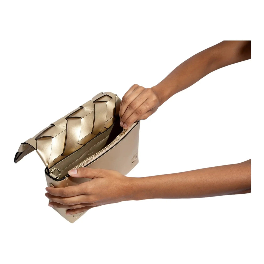 THE ZENOBIA WOVEN CLUTCH in gold with zipper opening and woven texture