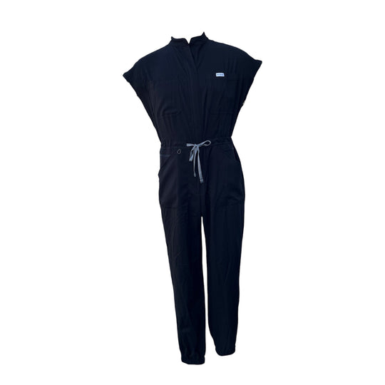 Black jogger scrub jumpsuit, front zip, drawstring waist, patch pockets, tapered legs.