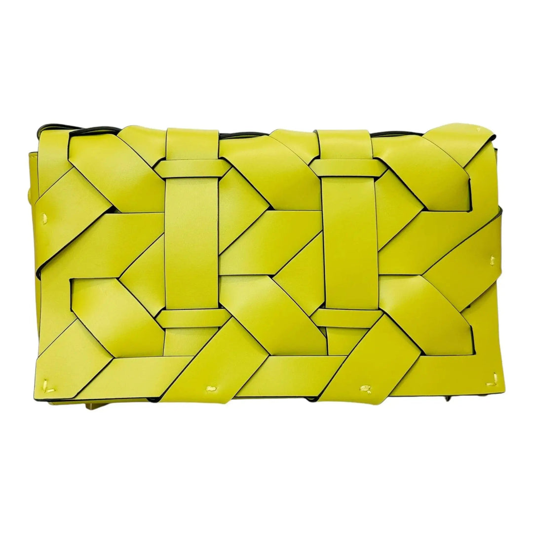 Mint green woven clutch with geometric panel texture and structured top