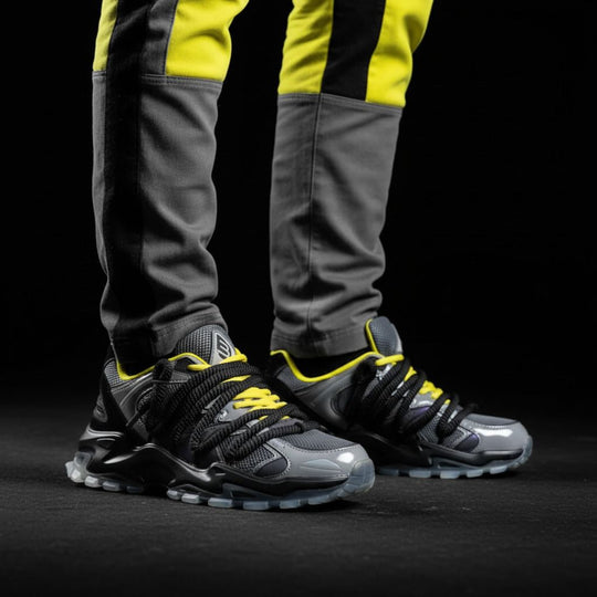 ICON V2 Shadow Sneaker seitlich, schwarz/grau mit neon-gelben Akzenten und Schnürung