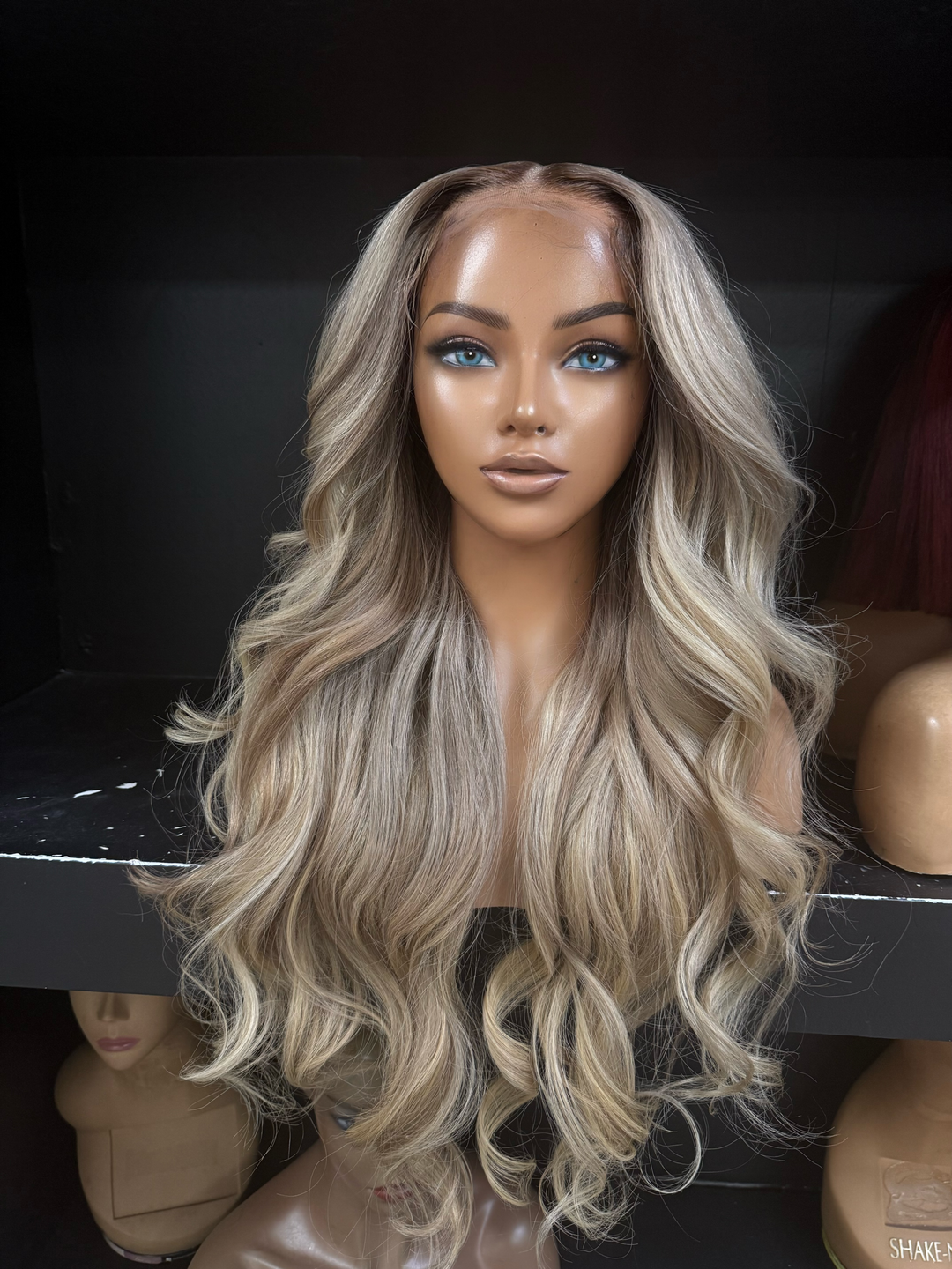 Empress Unit: long wavy blonde hair unit with middle part on mannequin head