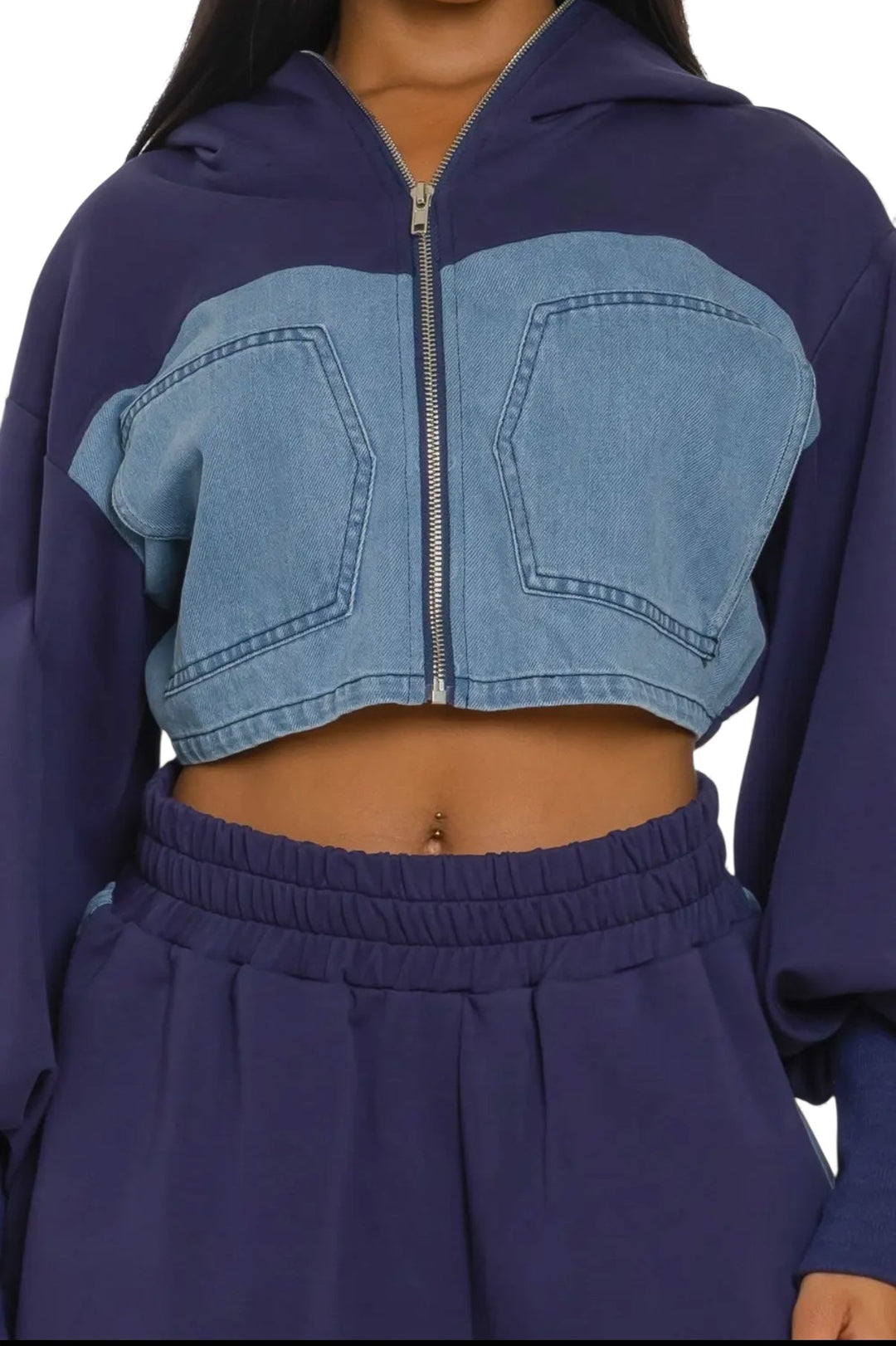Two-tone denim zip-up hoodie close-up with chest pockets and elastic waist pants