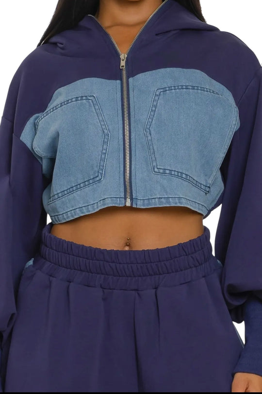 Two-tone denim zip-up hoodie close-up with chest pockets and elastic waist pants