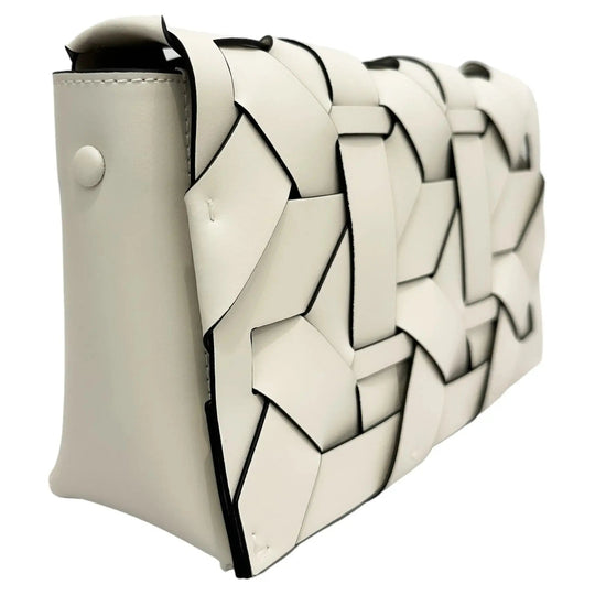 Ivory THE ZENOBIA woven clutch, side view with sculpted geometric weave panels