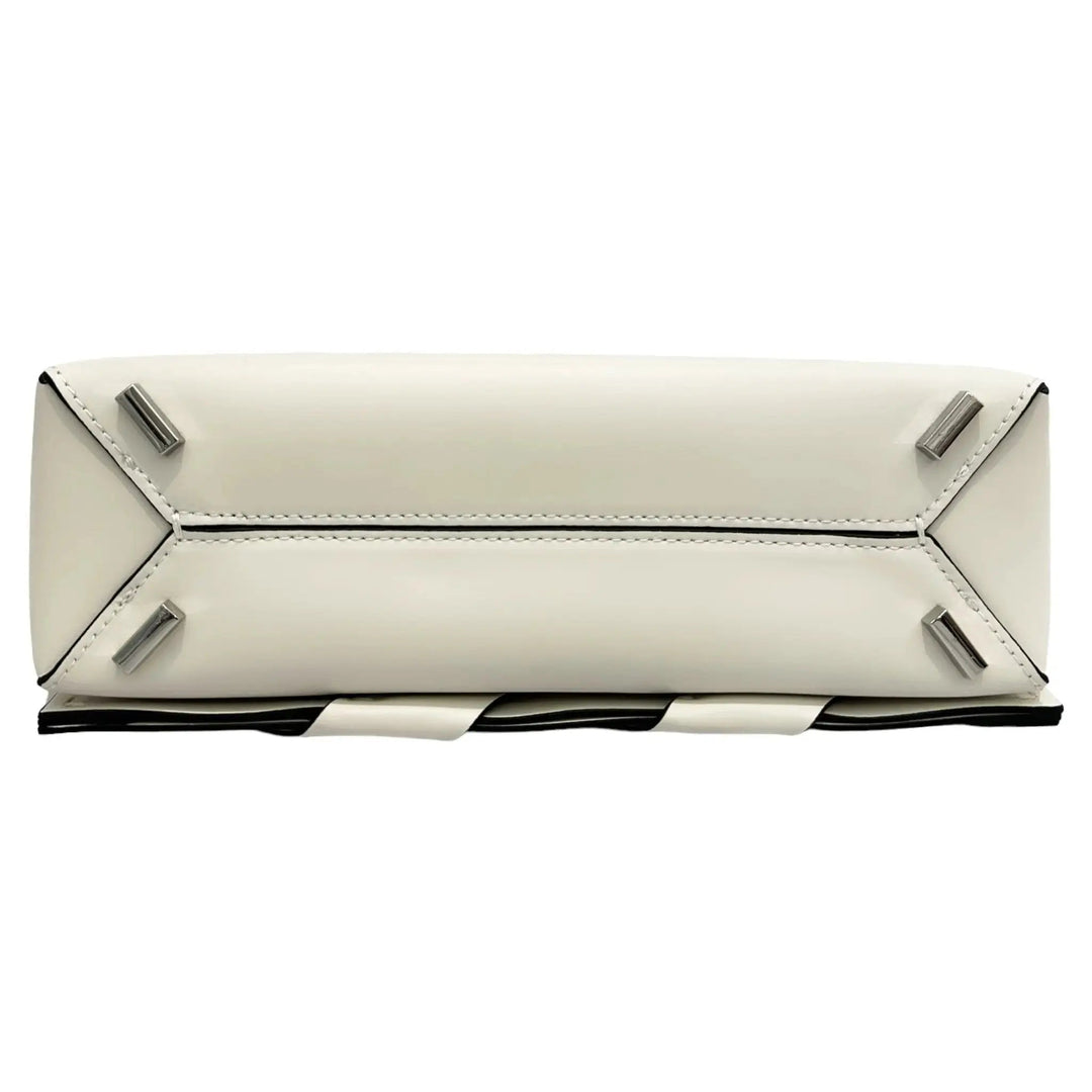 Ivory clutch back with fold-over flap, two silver hardware tabs, and seam stitching