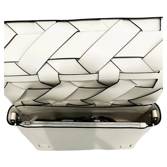Ivory woven clutch open top showing interior lining and zipper closure