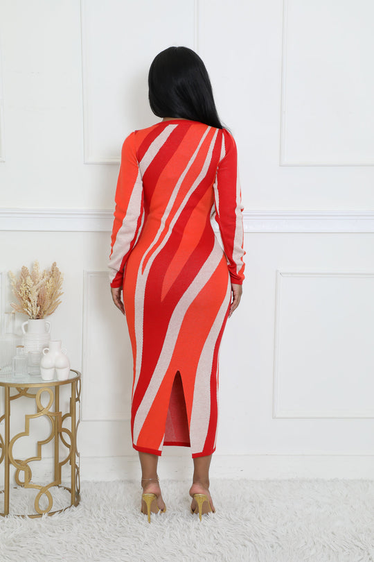 Back view of red midi dress with white wavy stripes and long sleeves