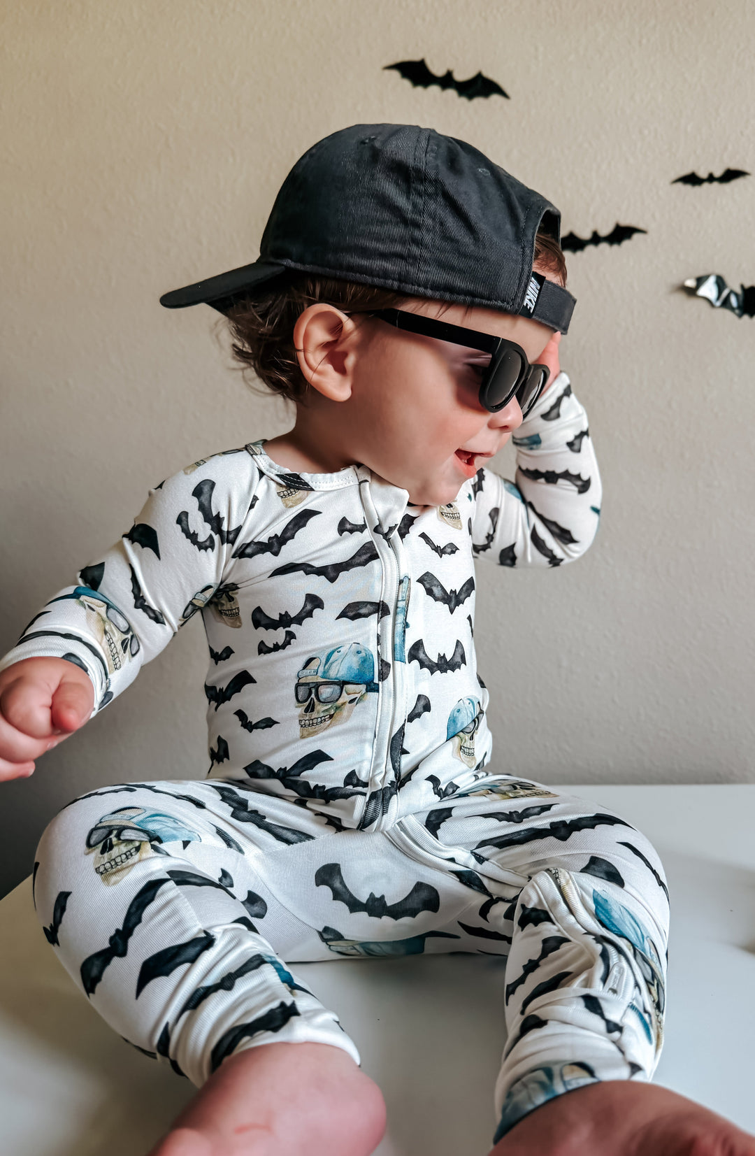 Bamboo zippy pajamas with full-zip front, bat print and blue skull graphic