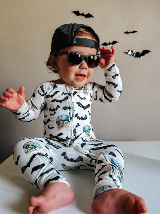 Bamboo zippy pajamas with zip-front and bat-and-skull pattern, long legs and cuffs