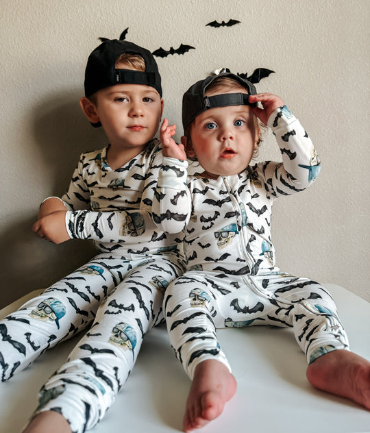 Bamboo zippy pajamas with zip-front, bats and blue skull print on long sleeves and legs