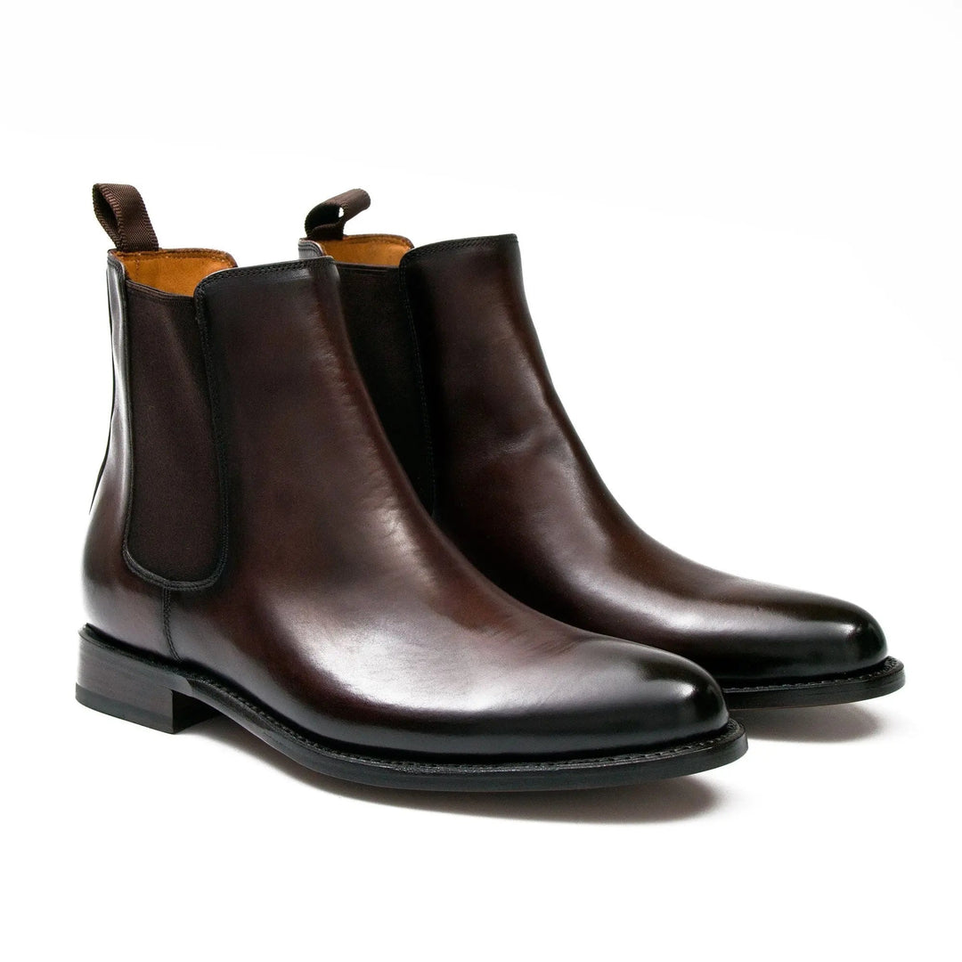 Brown Chelsea boots with elastic side gore, Goodyear welt stitch line, low stacked heel