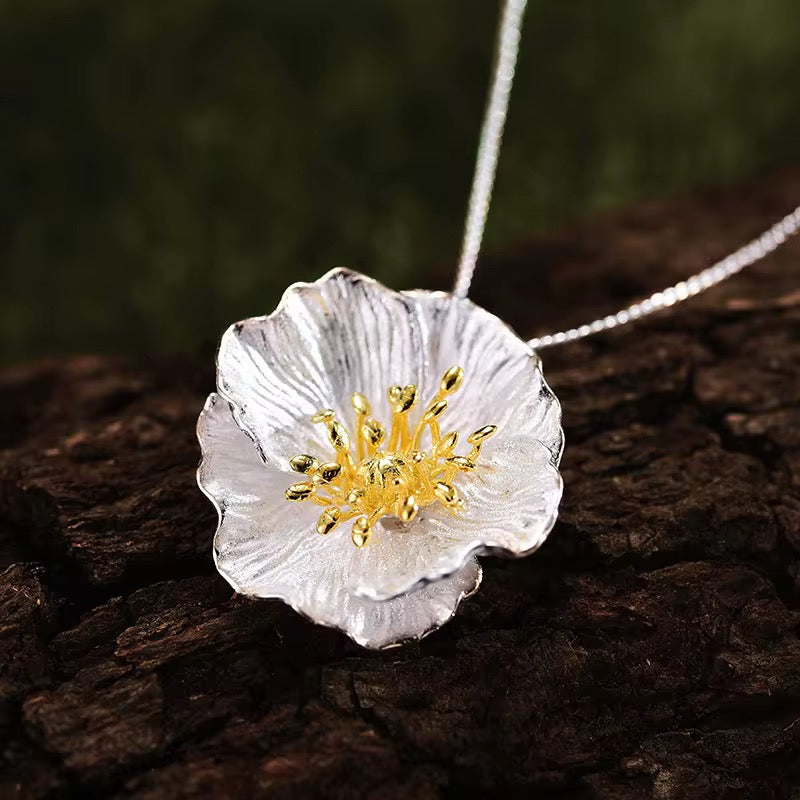 Wildflower Blossom necklace pendant in silver with gold center on chain