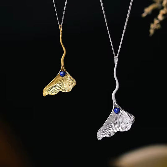 Ginkgo Elegance Pendant: ginkgo leaf pendant, blue bead, silver and gold chains