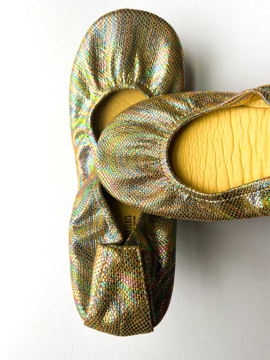 Metallic iridescent slip-on flats with bow detail, cushioned insole lining