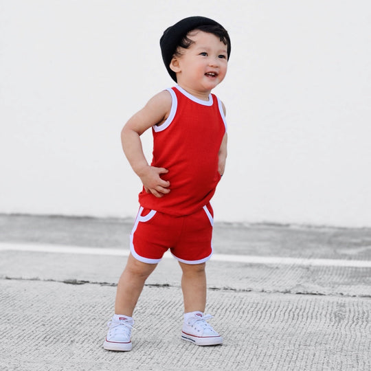 Red bamboo rib track shorts set with white trim, sleeveless tank and shorts