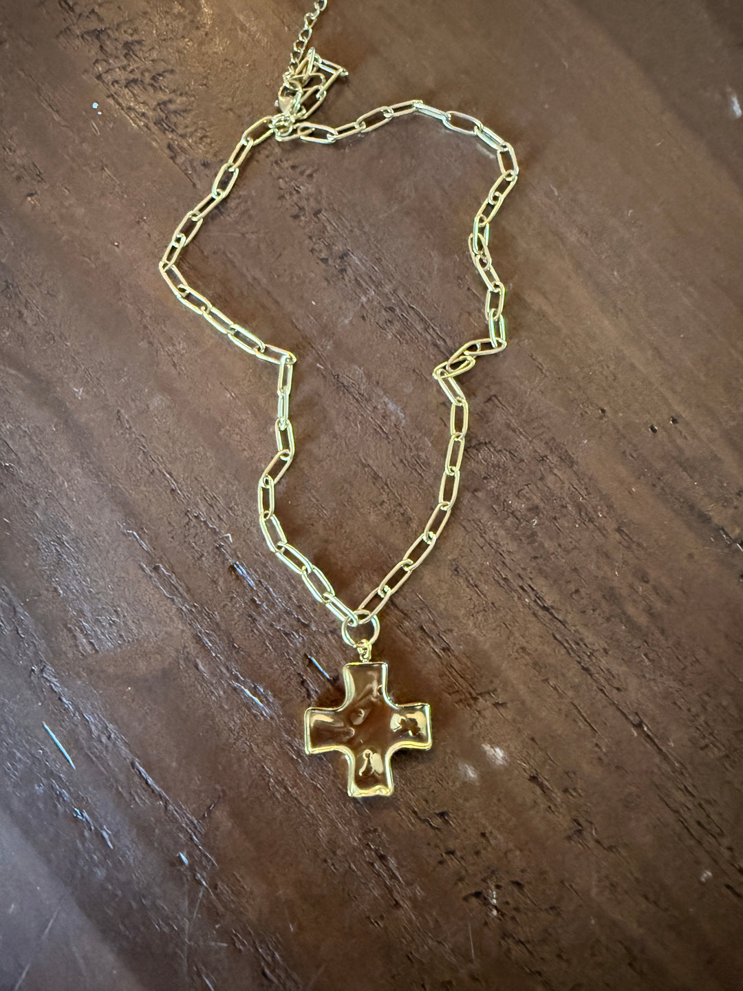 Chunky hammered cross pendant on gold-tone chain necklace with clasp