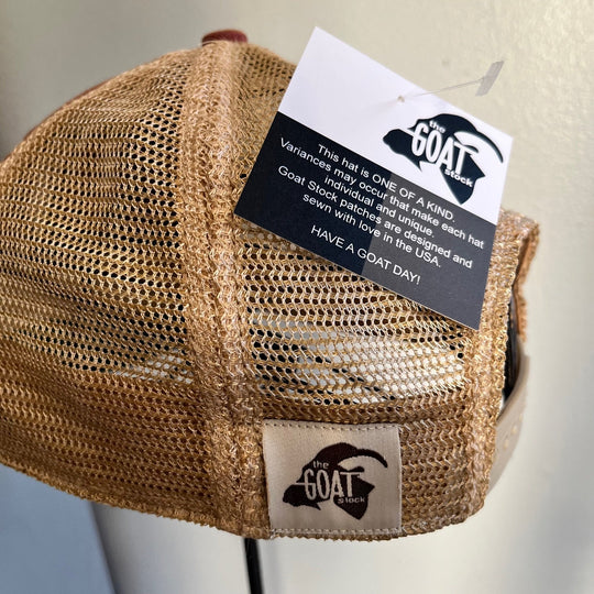 Tan/gold mesh snapback cap with front patch and woven label, back view