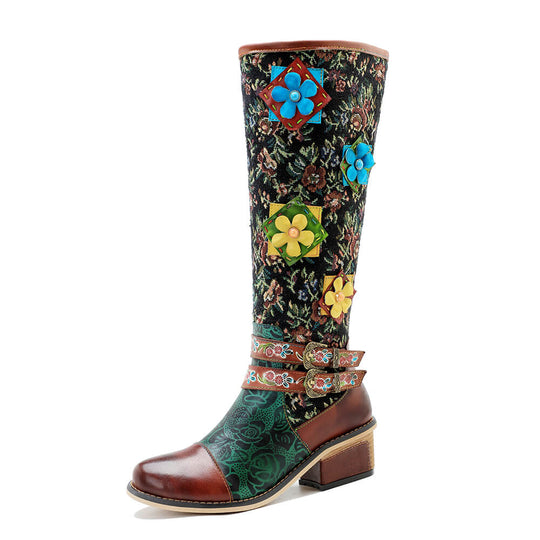 Single tall boot with floral tapestry fabric, blue and green flower appliqués, mid heel