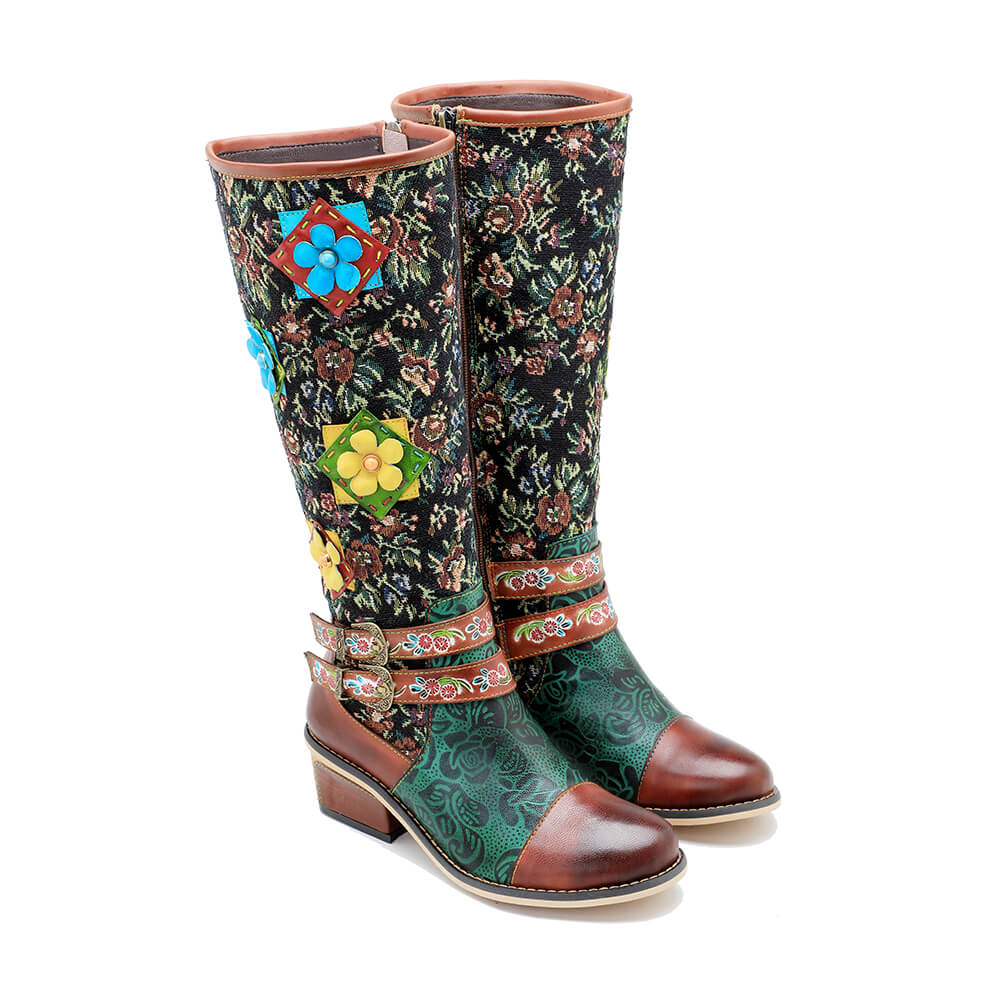 Pair of tall boots with 3D blue and green flowers, patterned shaft, chunky block heels