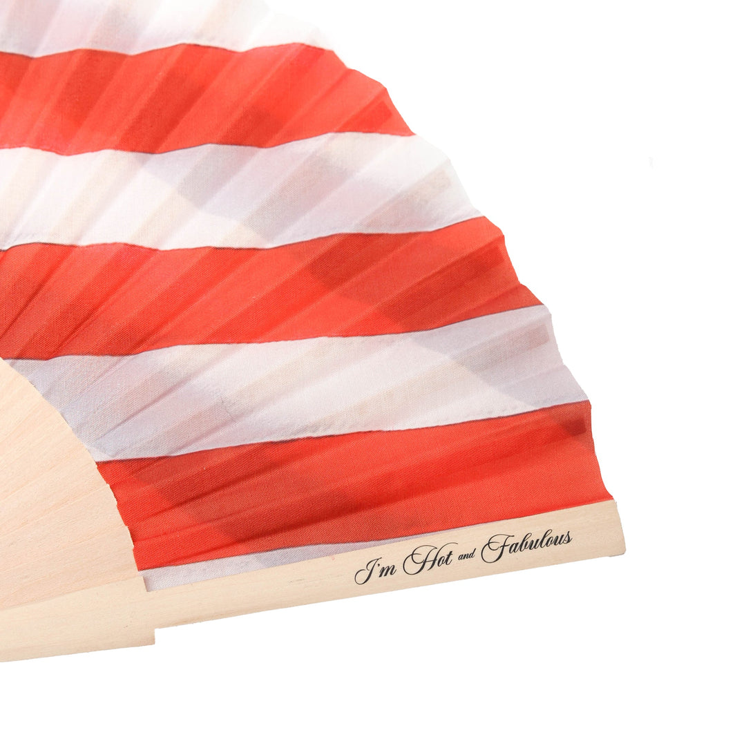 Hand fan close-up: red-and-white stripes with &