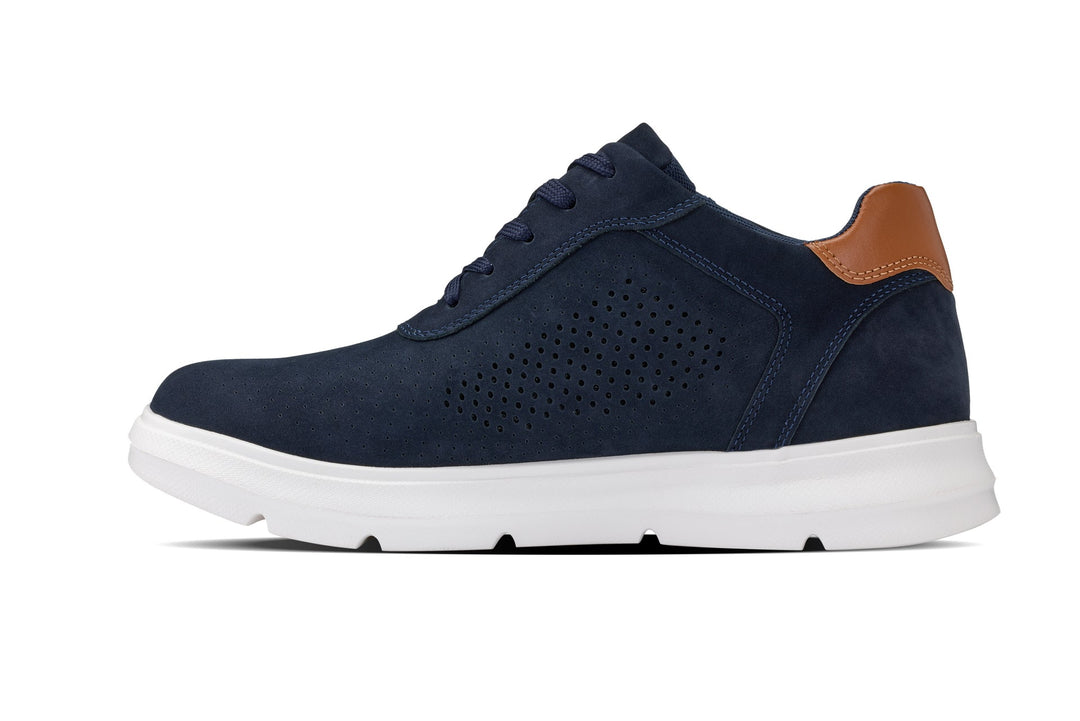 Navy suede low-top sneaker with lace-up, perforated panel and tan heel collar, white outsole