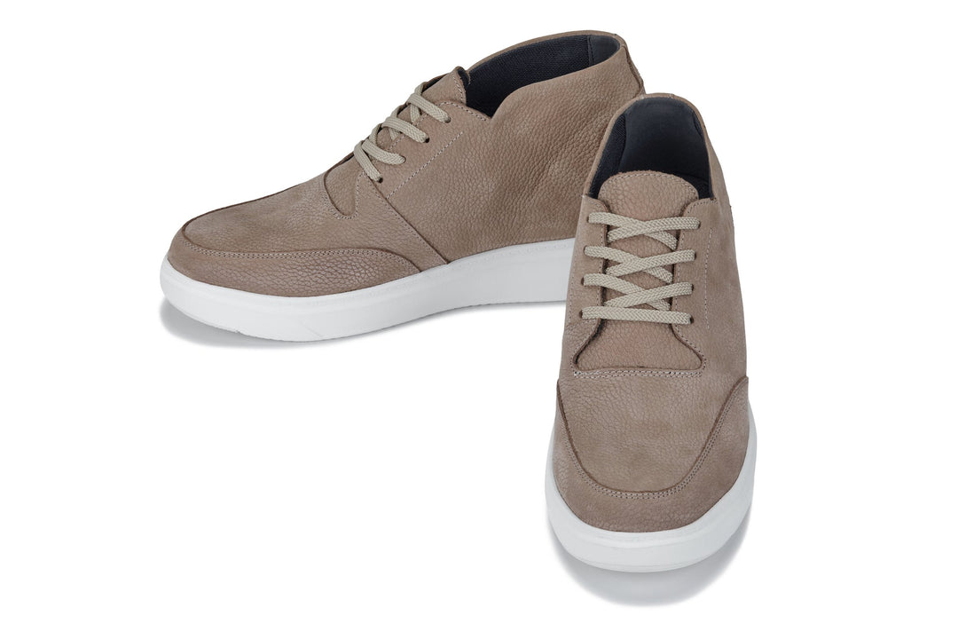 Khaki lace-up boots angled side view showing padded heel and chunky sole
