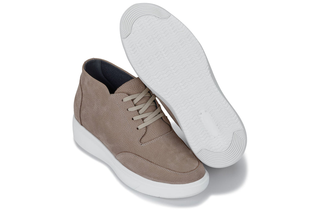 Khaki boots with laced vamp and outsole view paired with off-white tread