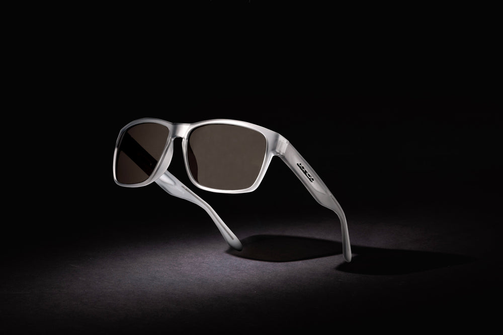Frozen Ash golf sunglasses with dark brown lenses and curved, sporty temple arms