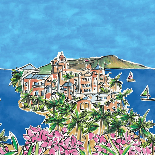 Close-up of blue kimono print with illustrated buildings, greenery, and pink flowers