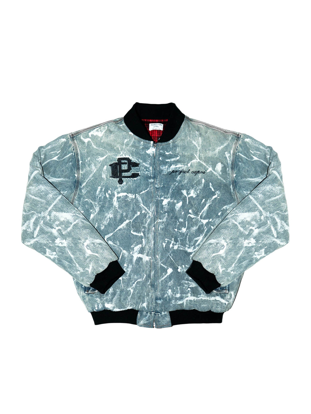 Reversible graffiti bomber: light blue splatter front with black ribbed cuffs and collar