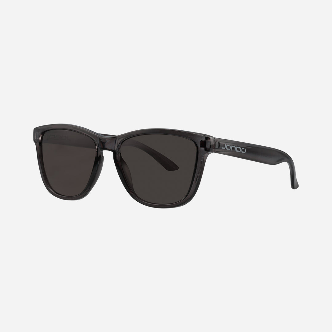 Fringe Golf sunglasses with dark frame and dark lenses, front view