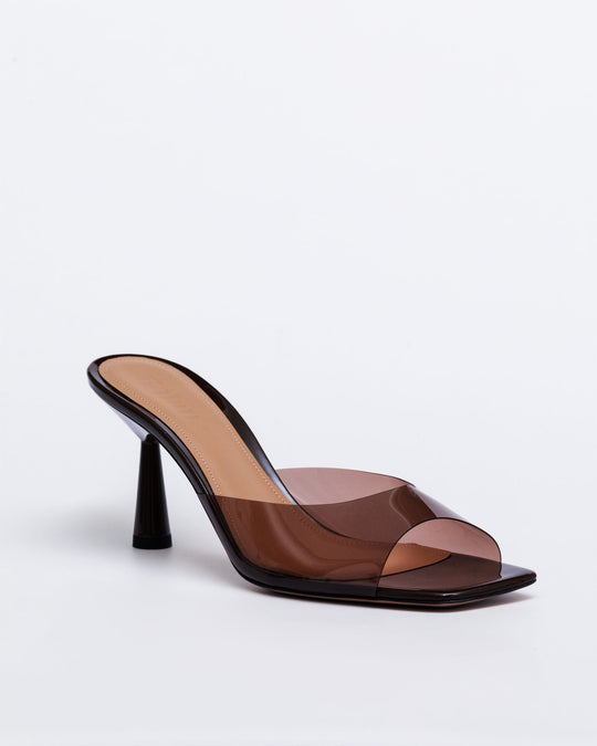 Chocolate brown mule with transparent upper panels and slim black block heel