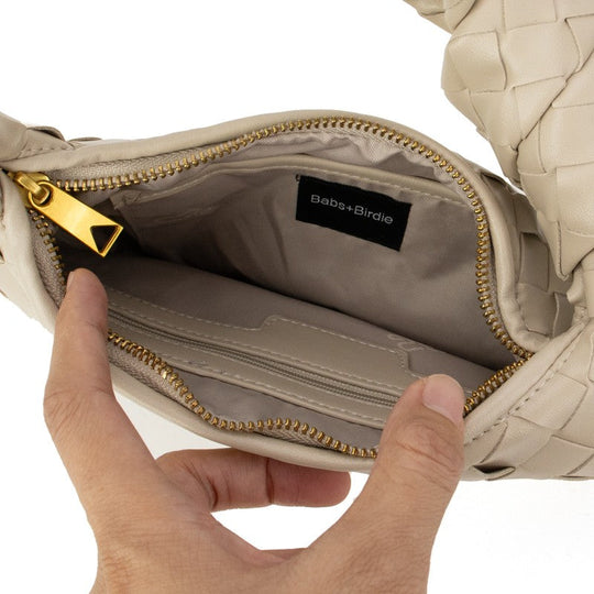 Khaki woven handbag interior, gold zipper, inner pocket label Babs+Birdie